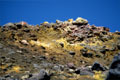 <center>Lave refroidie et coloration de ce pan par le soufre. etna volcan,eoliennes 